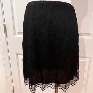 Kenneth Cole black lace mini skirt with hidden elastic waist side zip M